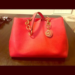 Micheal Kors bag, always authentic.